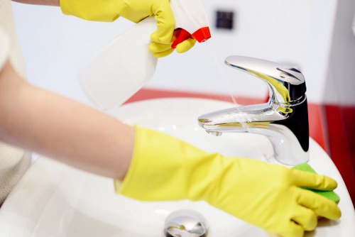 Carpet cleaning team reviewing safety precautions in NW6